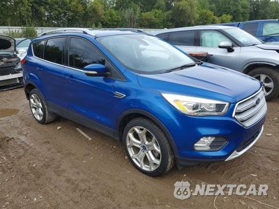 Czwarte zdjęcie samochodu z boku: 2019 FORD ESCAPE TITANIUM VIN:1FMCU9J90KUC50557 - miniatura