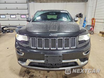 Piąte zdjęcie samochodu w środku: 2014 JEEP GRAND CHEROKEE SUMMIT VIN:1C4RJFJT4EC106490 - miniatura