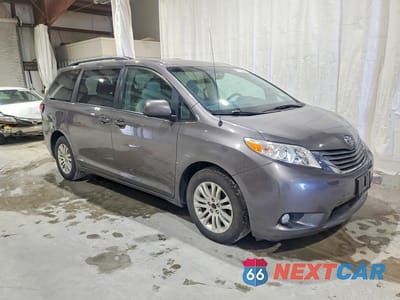 Czwarte zdjęcie samochodu z boku: 2014 TOYOTA SIENNA XLE 8-PASSENGER VIN:5TDYK3DC8ES510362 - miniatura