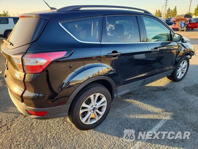 Trzecie zdjęcie samochodu z tyłu: 2018 FORD ESCAPE SE VIN:1FMCU0GD8JUD44417 - miniatura