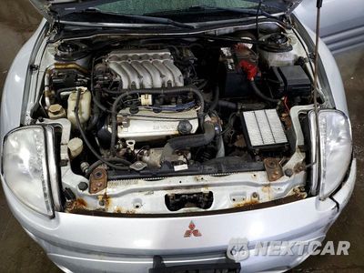 Zdjęcie 11 z 12 samochodu: 2003 MITSUBISHI ECLIPSE GTS VIN:4A3AC74H93E005416 - miniatura