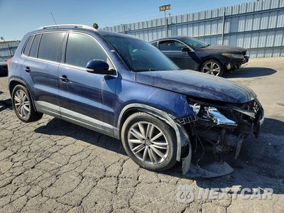 Czwarte zdjęcie samochodu z boku: 2011 VOLKSWAGEN TIGUAN S VIN:WVGAV7AX8BW506181 - miniatura