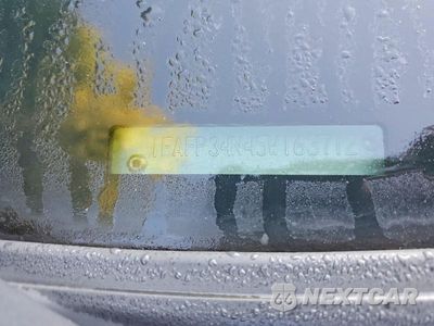 Zdjęcie 12 z 12 samochodu: 2005 FORD FOCUS ZX4 VIN:1FAFP34N45W163712 - miniatura