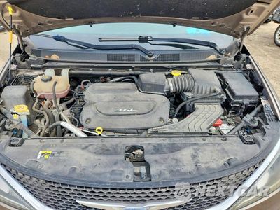 Zdjęcie 12 z 13 samochodu: 2018 CHRYSLER PACIFICA TOURING L PLUS VIN:2C4RC1EG1JR110914 - miniatura