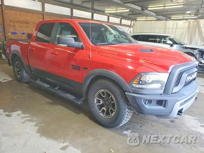 Czwarte zdjęcie samochodu z boku: 2016 RAM 1500 REBEL VIN:1C6RR7YT8GS371496 - miniatura