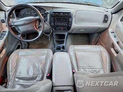 Zdjęcie 8 z 13 samochodu: 1999 FORD EXPLORER VIN:1FMDU35P1XZA34687 - miniatura