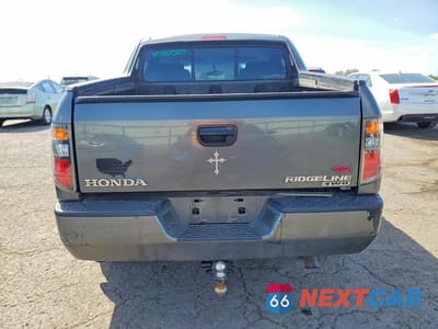 Zdjęcie 6 z 12 samochodu: 2008 HONDA RIDGELINE RT VIN:2HJYK16258H520161 - miniatura