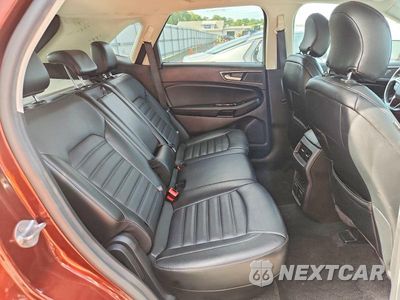 Zdjęcie 11 z 13 samochodu: 2015 FORD EDGE SEL VIN:2FMTK4J99FBB30048 - miniatura