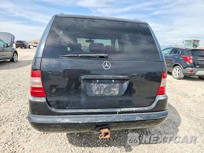 Zdjęcie 6 z 13 samochodu: 1999 MERCEDES-BENZ ML 430 VIN:4JGAB72E3XA083259 - miniatura