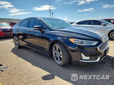 Czwarte zdjęcie samochodu z boku: 2019 FORD FUSION TITANIUM VIN:3FA6P0D93KR124044 - miniatura