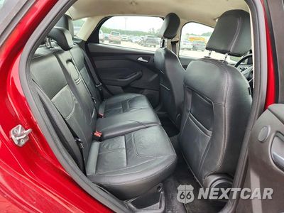 Zdjęcie 10 z 13 samochodu: 2016 FORD FOCUS TITANIUM VIN:1FADP3J26GL224936 - miniatura