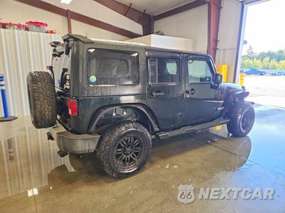 Trzecie zdjęcie samochodu z tyłu: 2012 JEEP WRANGLER UNLIMITED SAHARA VIN:1C4BJWEG3CL176221 - miniatura