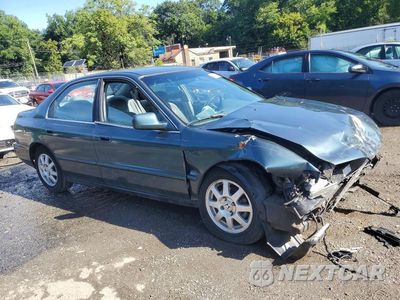 Czwarte zdjęcie samochodu z boku: 1997 HONDA ACCORD LX VIN:1HGCD5638VA241839 - miniatura