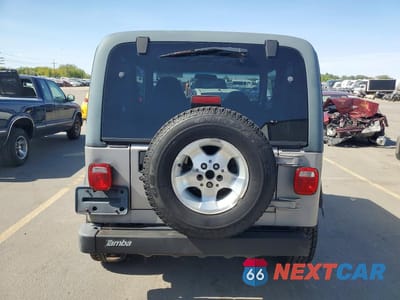 Zdjęcie 6 z 12 samochodu: 2001 JEEP WRANGLER / TJ SPORT VIN:1J4FA49S11P375255 - miniatura