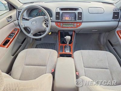 Zdjęcie 8 z 12 samochodu: 2004 TOYOTA CAMRY XLE VIN:4T1BE30K84U793717 - miniatura