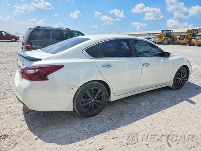 Trzecie zdjęcie samochodu z tyłu: 2017 NISSAN ALTIMA 2.5 SR VIN:1N4AL3APXHC246661 - miniatura