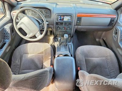 Zdjęcie 8 z 12 samochodu: 1999 JEEP GRAND CHEROKEE LAREDO VIN:1J4GW58S7XC752961 - miniatura