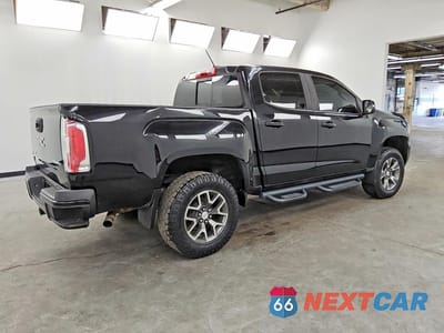 Trzecie zdjęcie samochodu z tyłu: 2017 GMC CANYON SLE VIN:1GTG6CEN9H1188073 - miniatura