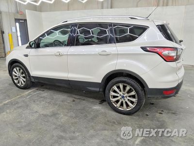 Drugie zdjęcie samochodu z przodu: 2017 FORD ESCAPE TITANIUM VIN:1FMCU9J90HUE72590 - miniatura