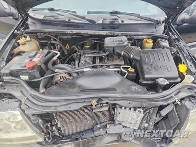 Zdjęcie 12 z 14 samochodu: 2001 JEEP GRAND CHEROKEE LAREDO VIN:1J4GW48S11C640853 - miniatura