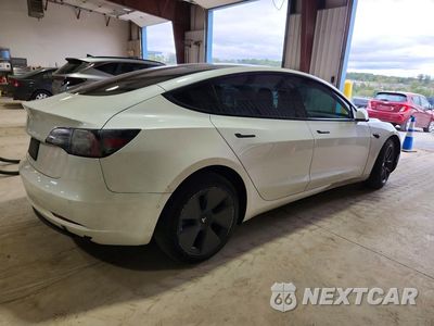 Trzecie zdjęcie samochodu z tyłu: 2021 TESLA MODEL 3 VIN:5YJ3E1EA5MF994321 - miniatura
