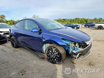 Czwarte zdjęcie samochodu z boku: 2023 TESLA MODEL Y VIN:7SAYGDEE5PF889497 - miniatura