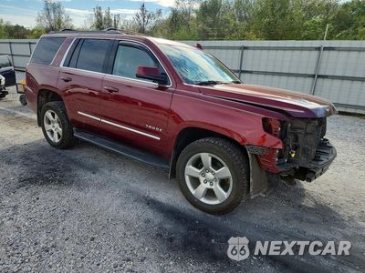 Czwarte zdjęcie samochodu z boku: 2020 CHEVROLET TAHOE K1500 LT VIN:1GNSKBKC1LR132715 - miniatura