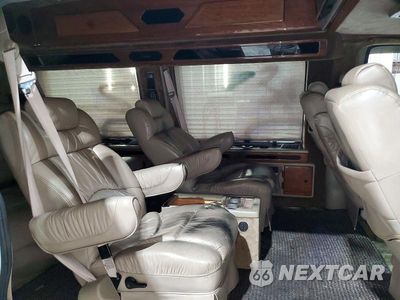Zdjęcie 11 z 13 samochodu: 1999 GMC SAVANA RV G1500 VIN:1GDFG15R3X1012078 - miniatura