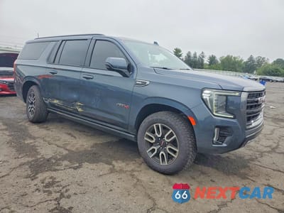 Czwarte zdjęcie samochodu z boku: 2021 GMC YUKON XL K1500 AT4 VIN:1GKS2HKD6MR167146 - miniatura