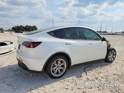 Trzecie zdjęcie samochodu z tyłu: 2023 TESLA MODEL Y VIN:7SAYGDEEXPA043766 - miniatura