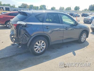 Trzecie zdjęcie samochodu z tyłu: 2016 MAZDA CX-5 TOURING VIN:JM3KE2CYXG0620122 - miniatura