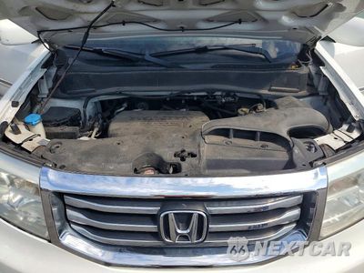 Zdjęcie 12 z 13 samochodu: 2014 HONDA PILOT TOURING VIN:5FNYF4H95EB052132 - miniatura