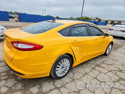 Trzecie zdjęcie samochodu z tyłu: 2016 FORD FUSION SE HYBRID VIN:3FA6P0LU1GR333036 - miniatura