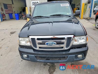 Piąte zdjęcie samochodu w środku: 2011 FORD RANGER SUPER CAB VIN:1FTKR1EE2BPB18831 - miniatura
