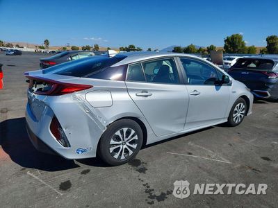 Trzecie zdjęcie samochodu z tyłu: 2021 TOYOTA PRIUS PRIME XLE VIN:JTDKAMFP2M3192172 - miniatura