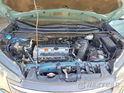 Zdjęcie 12 z 13 samochodu: 2014 HONDA CR-V EXL VIN:2HKRM4H78EH720662 - miniatura