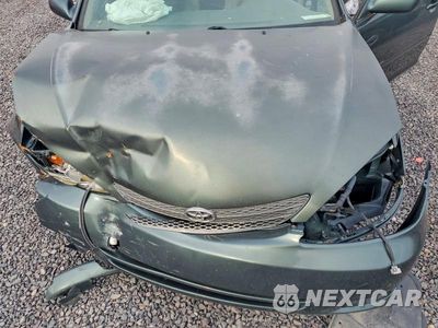 Zdjęcie 11 z 12 samochodu: 2002 TOYOTA CAMRY LE VIN:JTDBE32K820103096 - miniatura