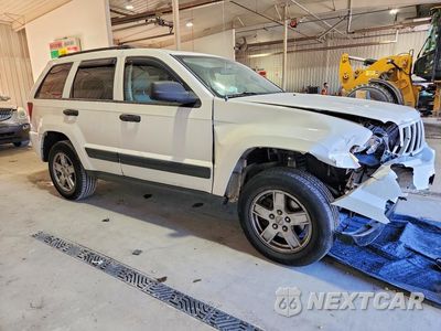 Czwarte zdjęcie samochodu z boku: 2006 JEEP GRAND CHEROKEE LAREDO VIN:1J4GR48K56C250515 - miniatura