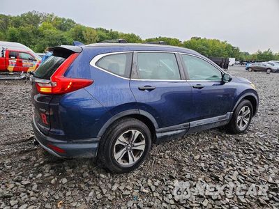 Trzecie zdjęcie samochodu z tyłu: 2018 HONDA CR-V LX VIN:2HKRW6H35JH203252 - miniatura