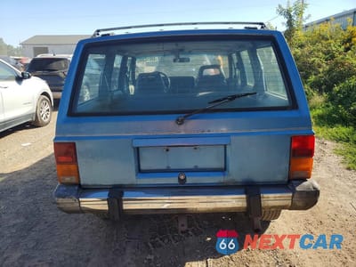 Zdjęcie 6 z 13 samochodu: 1990 JEEP CHEROKEE LAREDO VIN:1J4FJ58L4LL148491 - miniatura