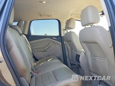 Zdjęcie 11 z 13 samochodu: 2016 FORD ESCAPE TITANIUM VIN:1FMCU0J95GUB08272 - miniatura