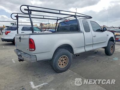 Trzecie zdjęcie samochodu z tyłu: 1999 FORD F150 VIN:1FTRX17W0XKB74913 - miniatura