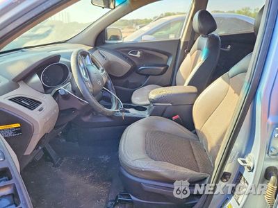 Zdjęcie 7 z 14 samochodu: 2011 HYUNDAI TUCSON GLS VIN:KM8JU3AC9BU196403 - miniatura