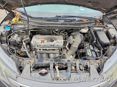 Zdjęcie 11 z 12 samochodu: 2013 HONDA CR-V EXL VIN:2HKRM4H75DH667840 - miniatura
