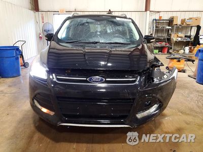 Piąte zdjęcie samochodu w środku: 2016 FORD ESCAPE TITANIUM VIN:1FMCU9J97GUB85844 - miniatura