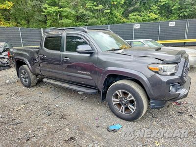 Czwarte zdjęcie samochodu z boku: 2019 TOYOTA TACOMA TRD SPORT VIN:3TMDZ5BN0KM064925 - miniatura