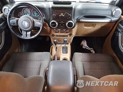 Zdjęcie 8 z 13 samochodu: 2011 JEEP WRANGLER UNLIMITED SAHARA VIN:1J4BA5H16BL575604 - miniatura