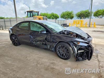 Czwarte zdjęcie samochodu z boku: 2025 TESLA MODEL 3 VIN:5YJ3E1EAXSF000596 - miniatura