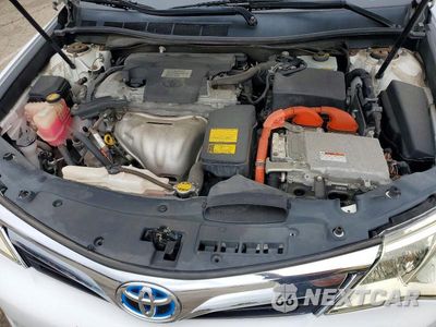 Zdjęcie 11 z 12 samochodu: 2012 TOYOTA CAMRY HYBRID XLE VIN:4T1BD1FK5CU048999 - miniatura