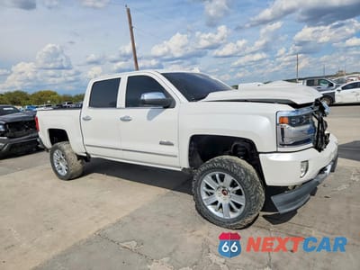 Czwarte zdjęcie samochodu z boku: 2018 CHEVROLET SILVERADO K1500 HIGH COUNTRY VIN:3GCUKTEC1JG186905 - miniatura